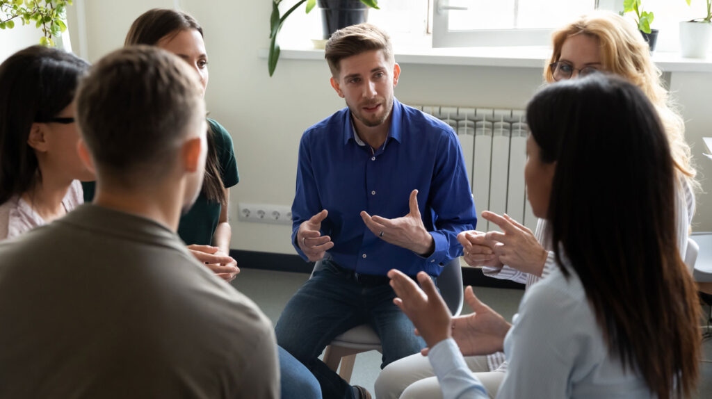 a group meets in a rehab center