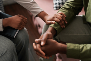a woman is comforted in acceptance and commitment therapy 