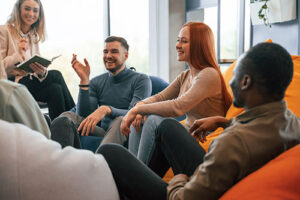 a therapy group meets within an addiction treatment program