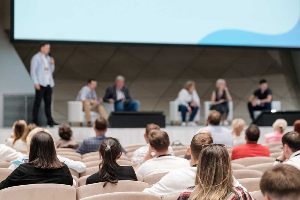 a group of people meet for a conference or seminar